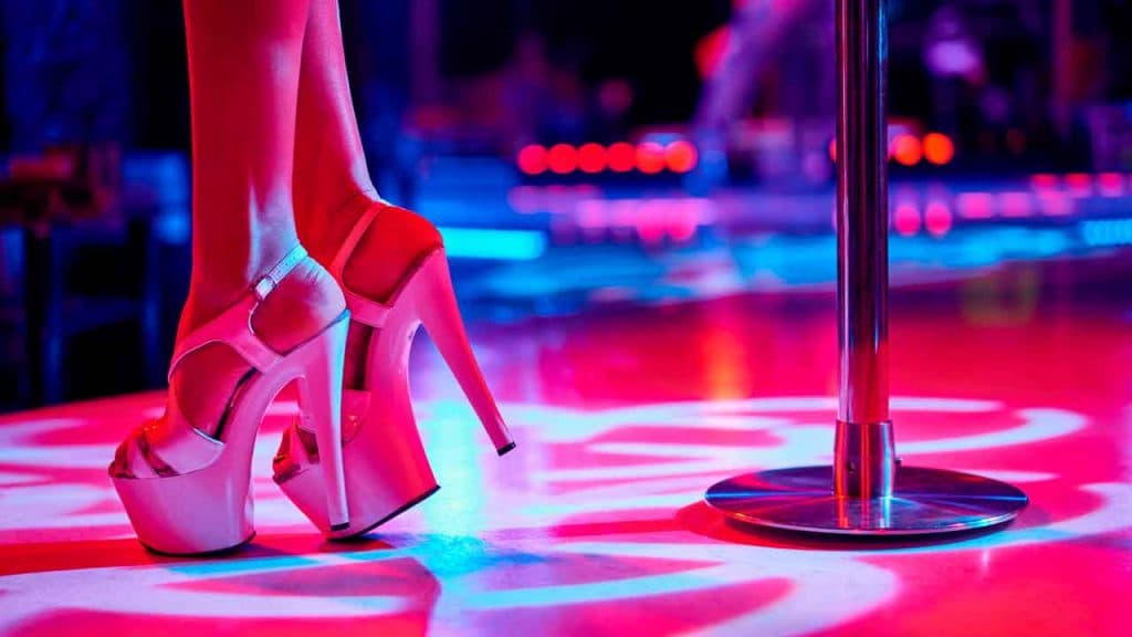 Teacher who took pupils to strip club while drunk on school trip banned from teaching