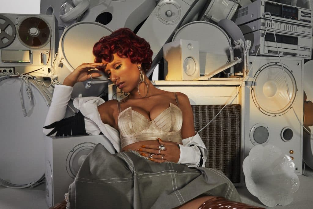 RAYE Brings In Coi Leray For ‘Flip A Switch’ Remix
